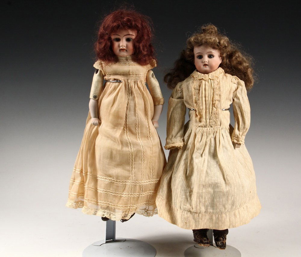 (2) GERMAN ANTIQUE BISQUE DOLLS - Including: 15" Red: (2) GERMAN ANTIQUE BISQUE DOLLS - Including: 15" Red Haired marked "Mma, 7/0", with brown sleep eyes, open/closed mouth with upper teeth, jointed kid body, pale pink taffeta dress with lace trim, silk