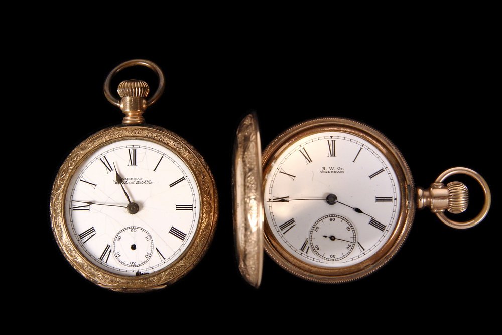 (2) POCKET WATCHES - Lot of (2) Gold Filled American: (2) POCKET WATCHES - Lot of (2) Gold Filled American Waltham Pocket Watches. Includes: Hunter cased watch with white porcelain dial and recessed seconds bit, movement marked 'American Waltham Watch Co