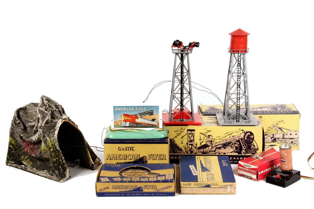(7) TOY TRAIN ACCESSORIES - A.C. Gilbert American: (7) TOY TRAIN ACCESSORIES - A.C. Gilbert American Flyer, all in original boxes but last, including: #557 Whistling Billboard (1948); #772 Automatic Water Tower (1948); #771 Floodlight Tower (1948); #5