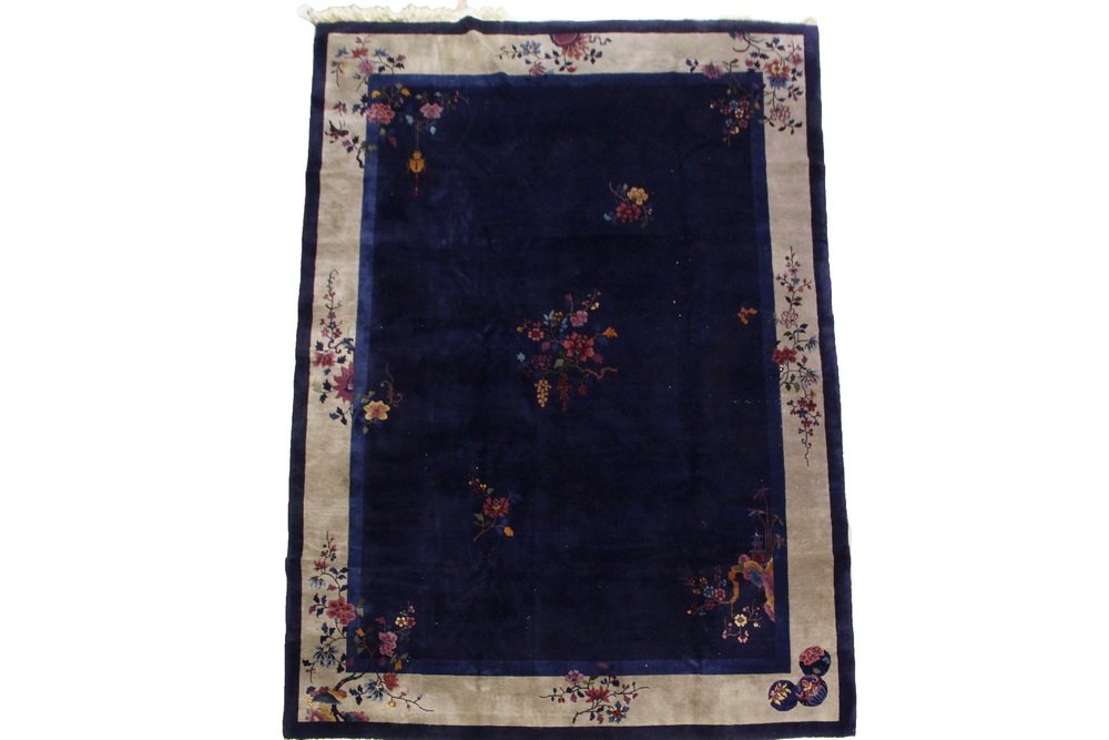 CHINESE ART DECO CARPET - 8'10" X 11'8" - Second: CHINESE ART DECO CARPET - 8'10" X 11'8" - Second quarter 20th c, floral medallions and spandrels in sky blue, royal blue, plum, merlot and gold. Set on a deep navy blue field, tan floral border. Good