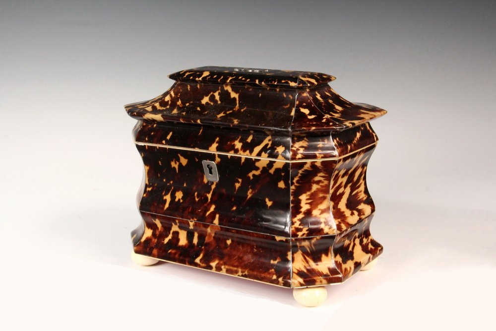 TEA CADDY - Early 19th c. Continental Tortoiseshell: TEA CADDY - Early 19th c. Continental Tortoiseshell Serpentine Front Two-Chamber Tea Caddy with coffin molded top, having all original silver trim and fittings, including 'B' engraved top plate, lock 