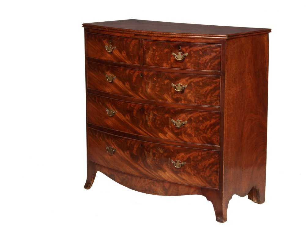 BOWFRONT DRESSER - Hepplewhite Period Dresser, in: BOWFRONT DRESSER - Hepplewhite Period Dresser, in figural mahogany, having a top with double-beaded edge, two over three graduated beaded edge drawers with later batwing brass pulls, with simple shape