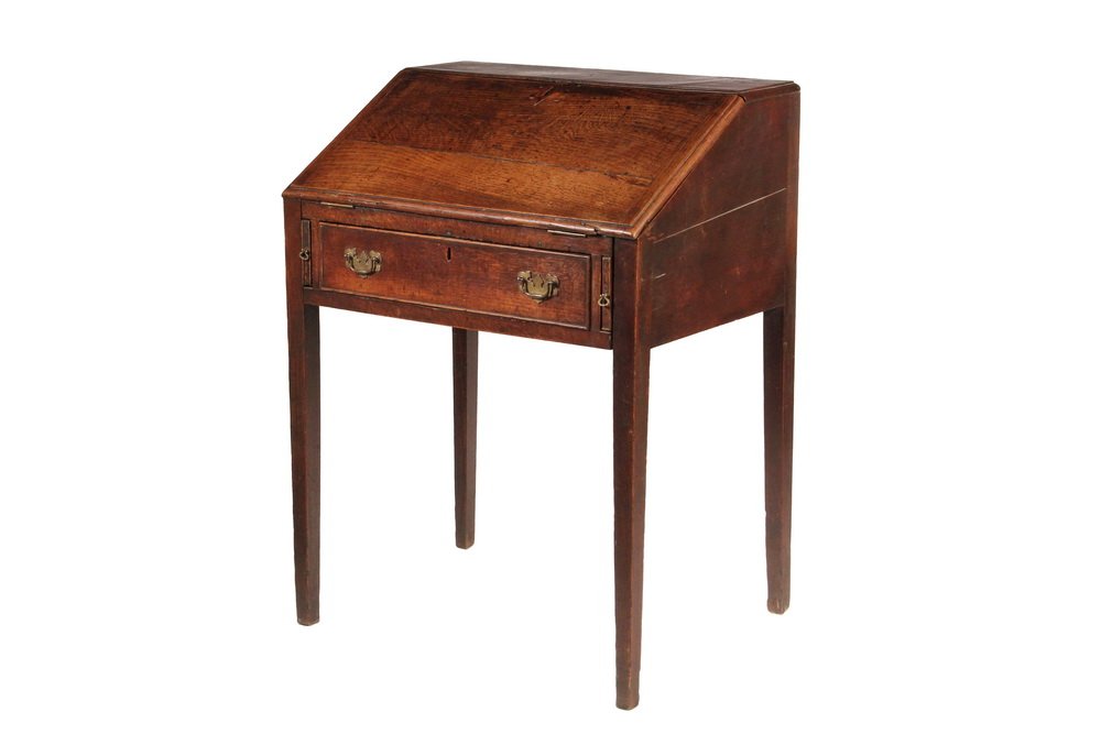 ENGLISH OAK SLANT LID DESK - Early 18th c. Country: ENGLISH OAK SLANT LID DESK - Early 18th c. Country Tradesman's Desk, having molded top, lid with molded breadboard ends, inlaid diamond escutcheon, interior with lower well, four over three substantia
