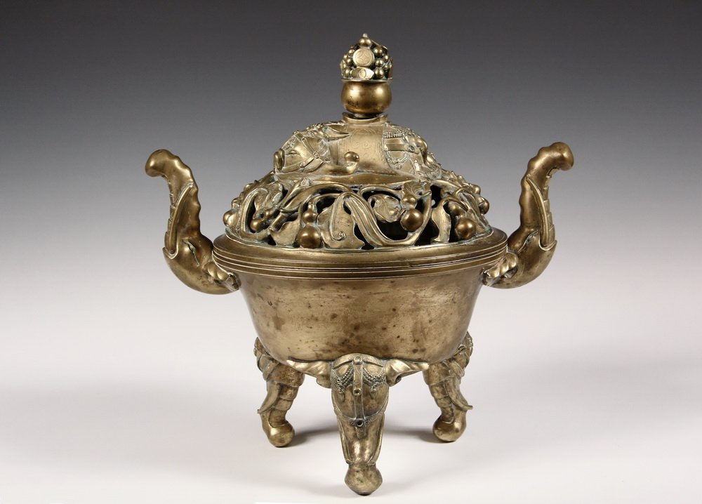 CHINESE BRONZE CENSER - Ming Dynasty Bronze Censer,: CHINESE BRONZE CENSER - Ming Dynasty Bronze Censer, bearing a Xuande mark (1426-1435) in Zhanshu or archaic seal script form, having a lid with reclining elephant, cauldron form finial full of fruit a