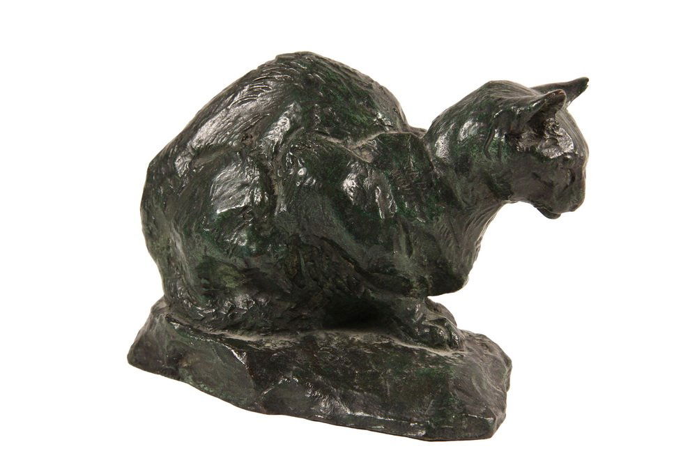 PIERRE ROBERT CHRISTOPHE (French, 1880-1971) - "Chat: PIERRE ROBERT CHRISTOPHE (French, 1880-1971) - "Chat Assis", a green patinated bronze casting of a reclining cat, signed on integral base "Christophe". 5 1/2" long. Fine condition.