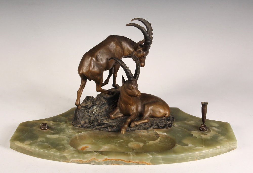 ART DECO PEN STAND - Green Onyx Pen Plateau with a Pair: ART DECO PEN STAND - Green Onyx Pen Plateau with a Pair of Bronze Gazelles mounted center back, the hoof of the reclining one resting in the dished area at center, left hand pen holder missing. Unmark