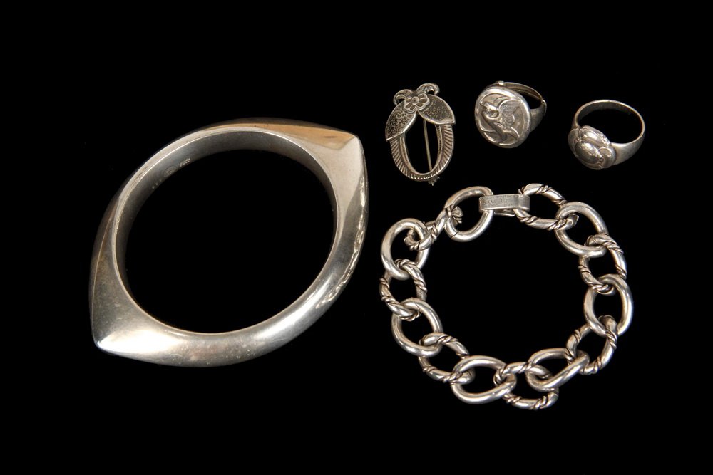 JENSEN JEWELRY - Collection of (5) Pieces of Sterling: JENSEN JEWELRY - Collection of (5) Pieces of Sterling Silver Jewelry by Georg Jensen, including: Bangle bracelet #111 by Nanna Ditzel, 3/8" wide, inside dimensions: 2 5/8" x 2 3/8"; Link bracelet #100