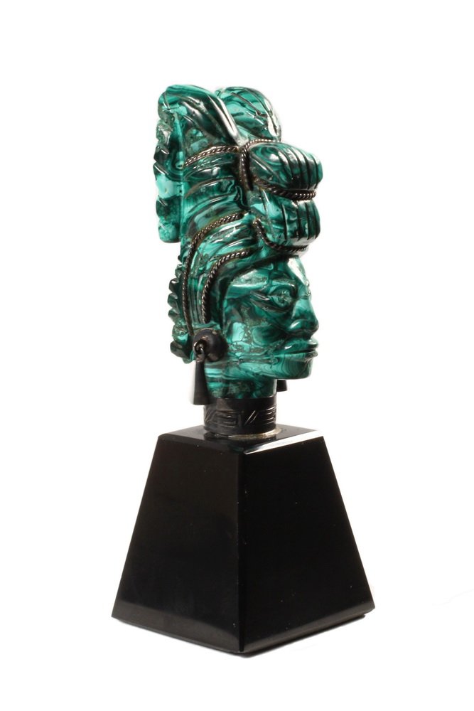 TAXCO SCULPTURE - Carved Malachite and Silver Head of a: TAXCO SCULPTURE - Carved Malachite and Silver Head of a Mayan Priest or Aj'kin, having .925 twisted wire overlay, pendant earrings and embossed collar, marked on back "Mexico, 925, Taxco", mounted on 