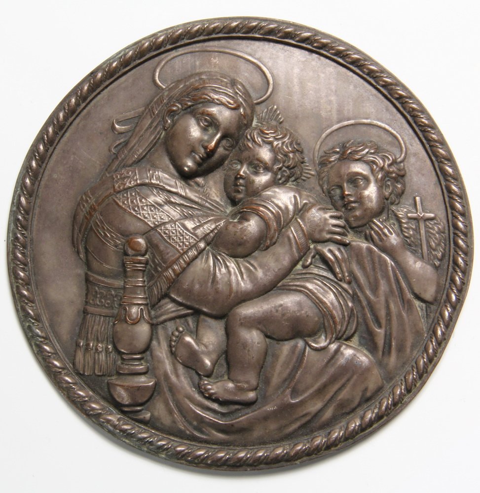 BAS RELIEF MEDALLION - Depicting Raphael's Madonna of: BAS RELIEF MEDALLION - Depicting Raphael's Madonna of Chair, silver over copper with lead backing, 19th c. 4 5/8" diam. Good condition. From the Marvin Sadik Collection.