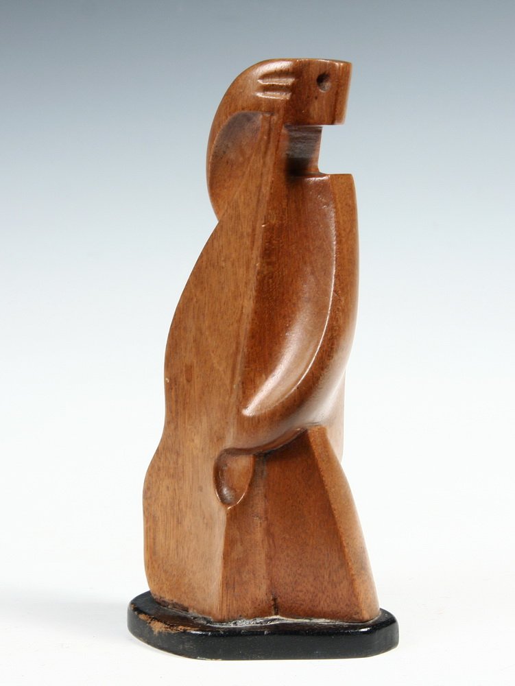WOOD SCULPTURE - Early 20th c. Cubist Carving of a: WOOD SCULPTURE - Early 20th c. Cubist Carving of a Standing Bass Player in solid mahogany, unsigned, on integral base, 8" tall overall. Fine condition.