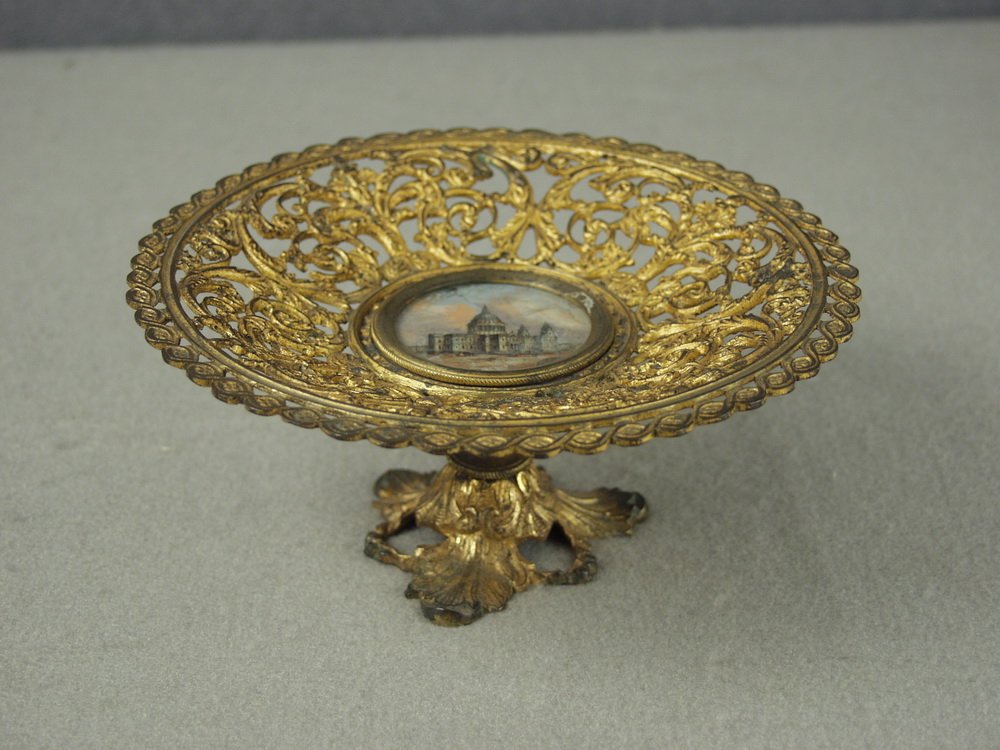 TAZZA - Victorian era gilded brass and reticulated: TAZZA - Victorian era gilded brass and reticulated Tazza with eglomise center depicting Saint Peter's Basilica, 3 3/4'' h x 8'' diam. Good condition.