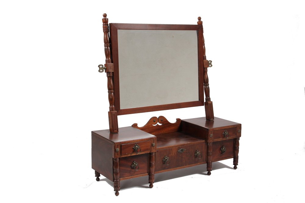 SHAVING MIRROR - Sheraton Period Shaving/Toilet Mirror: SHAVING MIRROR - Sheraton Period Shaving/Toilet Mirror with drop center shaped backsplash, single drawer flanked by sets of two drawers, turned legs extend to half column stiles, brass pulls and escut