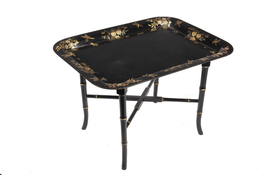 TRAY ON STAND - 19th c. Black Lacquered Papier Mache: TRAY ON STAND - 19th c. Black Lacquered Papier Mache Tray with wide rim, gilt and polychrome flower & insect decoration, on later faux bamboo base, having X stretcher. Mid 20th c. 20" t x 30" x 23". C