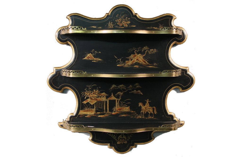 DESIGNER WALL SHELF - Custom Chinoiserie Wall Shelf by: DESIGNER WALL SHELF - Custom Chinoiserie Wall Shelf by Maitland-Smith of High Point, NC, with three serpentine front shelves set on a shaped backplate with gold molded edge, gold decoration on black l