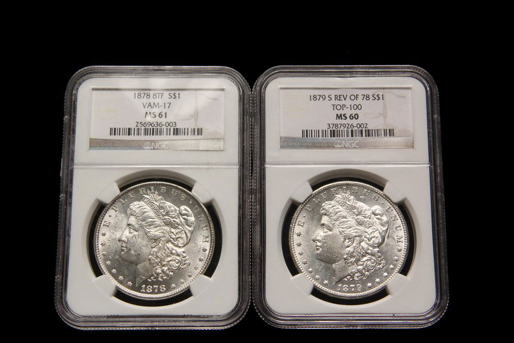 COINS - (2) Morgan Dollars: (1) 1879-S, REV of 78 NGC (1 of 2)
