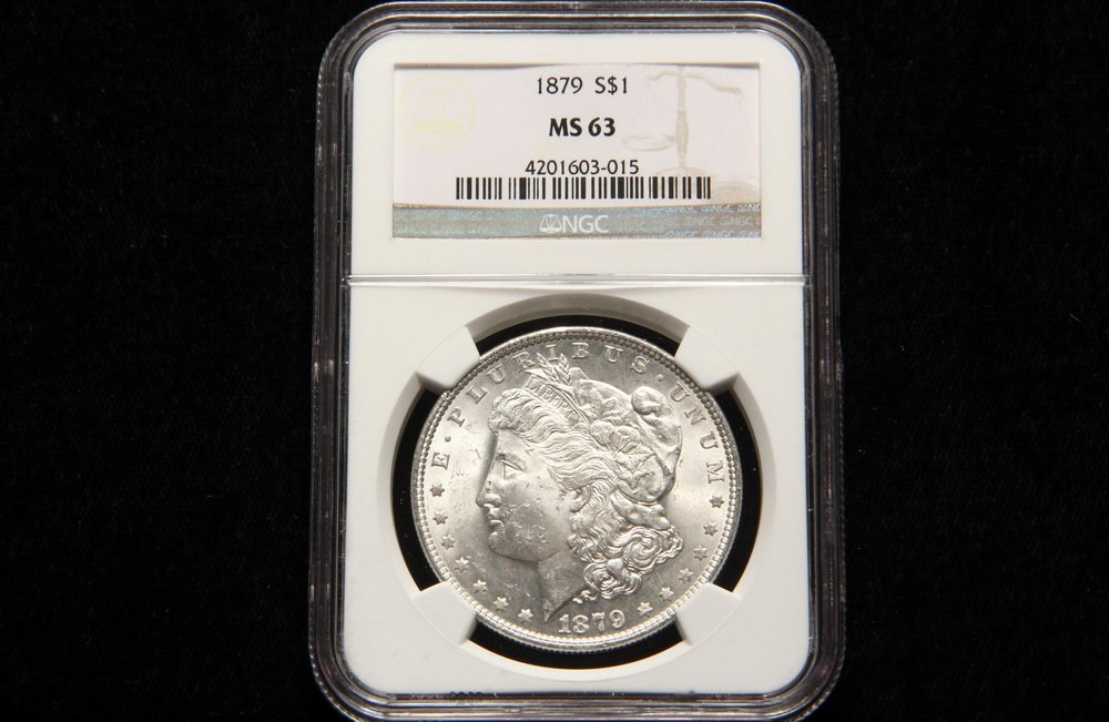 COIN - (1) 1879 Morgan Dollar, NGC MS 63. (1 of 3)