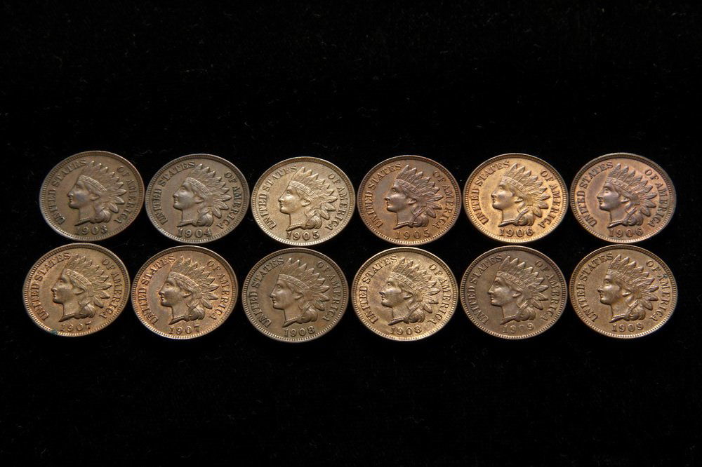COINS - Lot of (12) Indian Head Cents include; (1): COINS - Lot of (12) Indian Head Cents include; (1) 1903, XF; (1) 1904, XF; (2) 1905, R&B Unc; (2) 1906, R&B, Unc; (2) 1907 R&B, Unc; (2) 1908, Unc & XF; (2) 1909, Unc & AU.