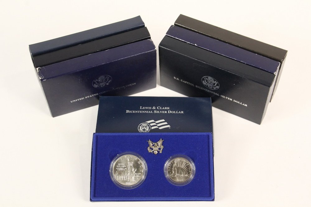 COINS - (8) Silver Dollars, includes: 1992 White House (1 of 1)