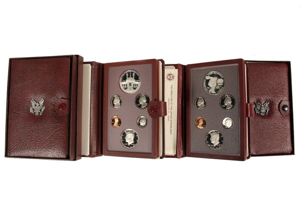 COINS - (4) Prestige Sets, includes: (2) 1983; (2) (1 of 1)