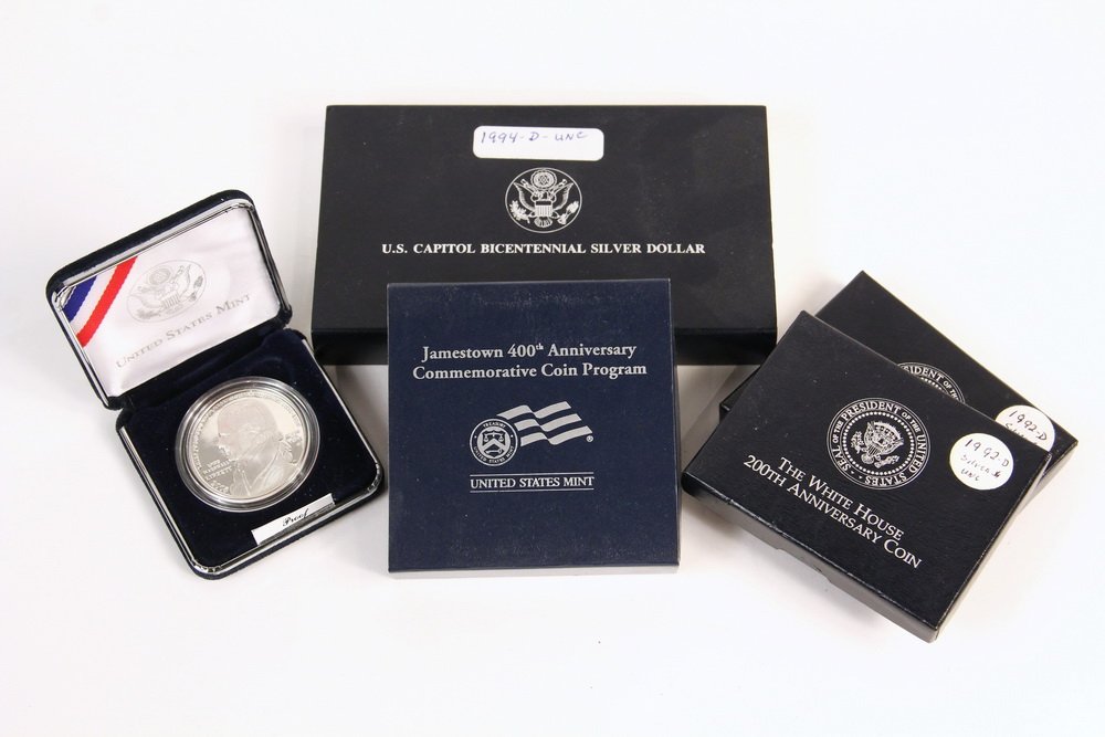 COINS - (5) Commemorative Silver Dollars include: (2): COINS - (5) Commemorative Silver Dollars include: (2) 1992 White House Dollars, BU; (1) Jamestown, Proof; (1) 2005 John Marshall, Proof; (1) 1994 Capitol Dollar, BU.