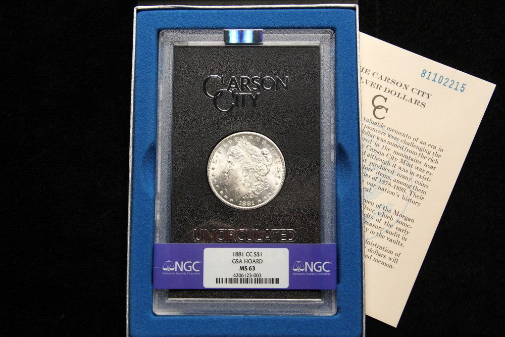 COIN - (1) 1881-CC Morgan Dollar GSA, with paper and (1 of 3)