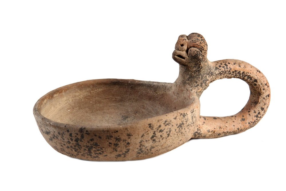PRECOLUMBIAN POTTERY - Mayan Pre-Classic Period Terra: PRECOLUMBIAN POTTERY - Mayan Pre-Classic Period Terra Cotta Oil Lamp with large anthropomorphic handle, deep round basin, about 400 AD, found in El Baul, Guatemala. 4 1/2" tall, 10" x 6 1/4". Good con