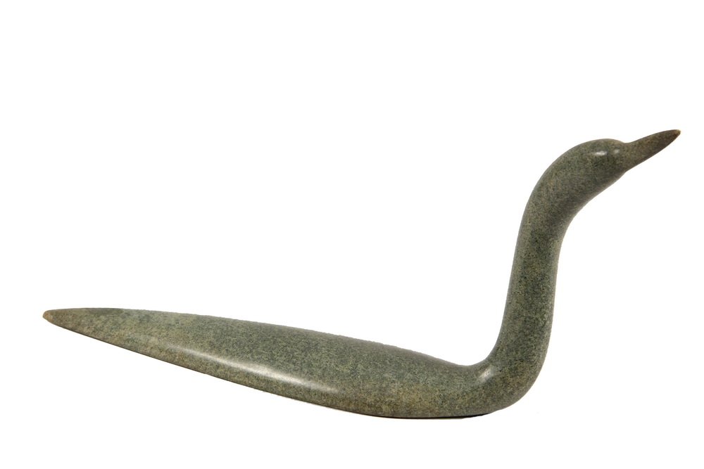 INUIT ESKIMO SCULPTURE - Green Soapstone Figure of a: INUIT ESKIMO SCULPTURE - Green Soapstone Figure of a Loon in Water, by Nunavit artist Ashevak Tunillee, Baffin Island, Cape Dorset, NWT, signed, circa 1970, 14" long. Good condition.