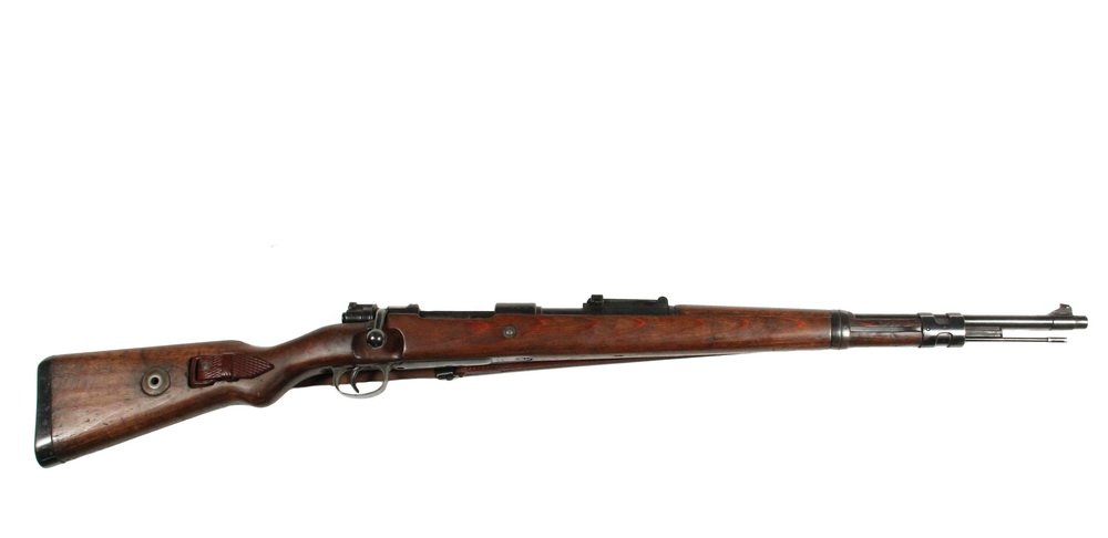 WWII GERMAN MAUSER RIFLE - Nazi proofed Model 98K/38: WWII GERMAN MAUSER RIFLE - Nazi proofed Model 98K/38 Bolt Action 8 mm Carbine Rifle, s/n 2938, black finish with S/42 receiver dated 1938. Military issue, original 23" barrel with 2000 metre rear ladd