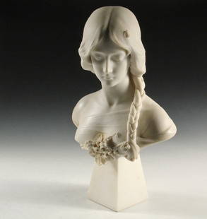ATTILIO FAGIOLI (Italy, 1877-1966) - Art Nouveau Bust: ATTILIO FAGIOLI (Italy, 1877-1966) - Art Nouveau Bust of a Lovely Young Girl with her hair in a single braid over her shoulder, blossoms at her breast, her eyes deflected, signed on the underside of h