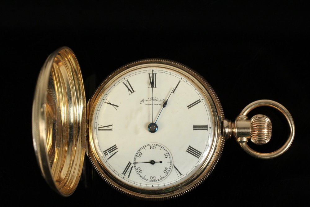 POCKETWATCH - Heavy 14K Yellow Gold 18-Size Hunter Case: POCKETWATCH - Heavy 14K Yellow Gold 18-Size Hunter Case American Watch Co. Lever Set Pocketwatch, with gilded movement marked P Bartlett #3689254, presentation on inside cover "William M. May from the