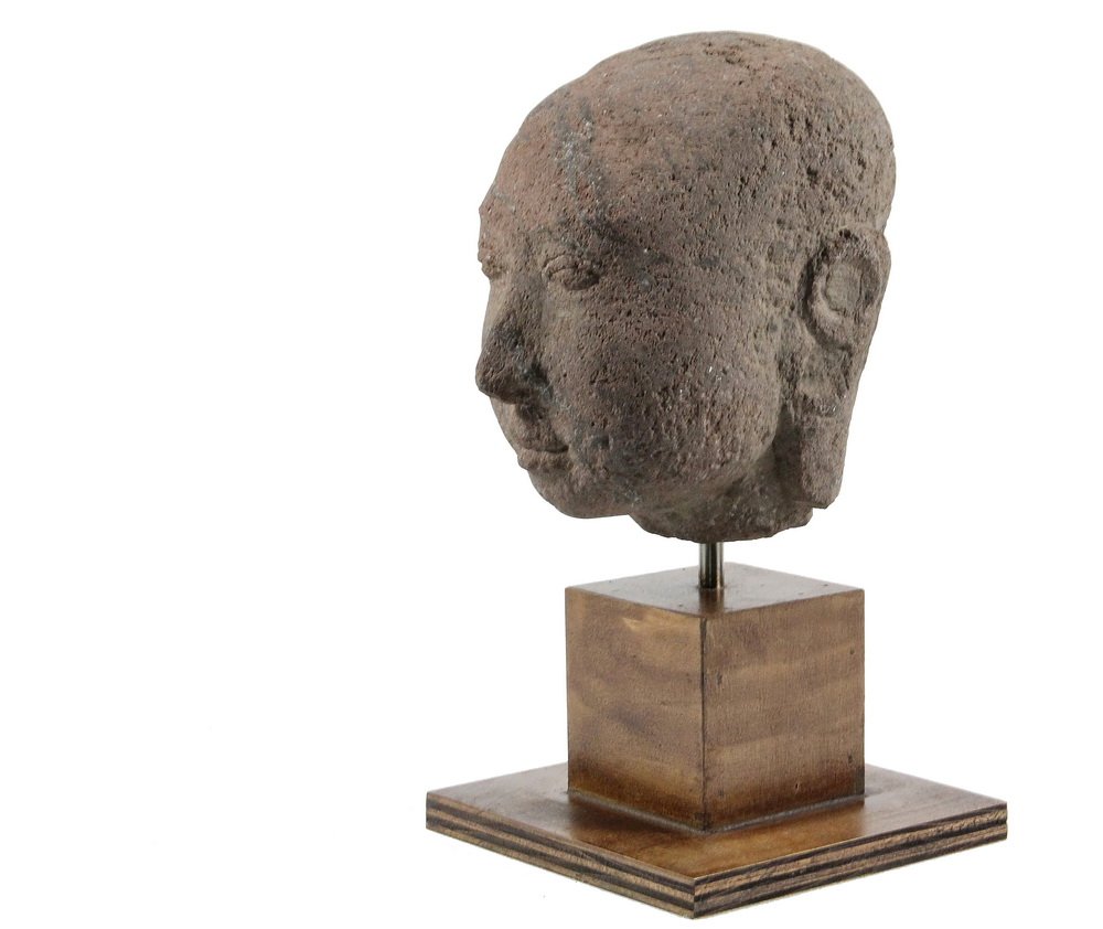 ANCIENT SINO-TIBETAN SCULPTURE - Head of a Buddhist: ANCIENT SINO-TIBETAN SCULPTURE - Head of a Buddhist Monk in red hardstone with gray striations, Song Dynasty (960-1276), Nyingma School, on a wooden display stand, 9" tall head, 14 3/4" tall overall, 