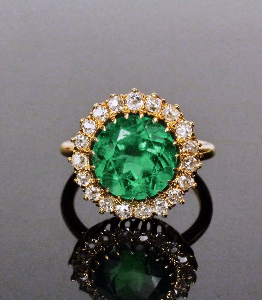 LADY'S RING - Antique 18K Yellow Gold, Round Emerald: LADY'S RING - Antique 18K Yellow Gold, Round Emerald and Old Mine Cut Diamond Ring. Centered by (1) round modified brilliant cut Columbian Natural Beryl Emerald weighing approx. 3.96 cts; Clarity Grad