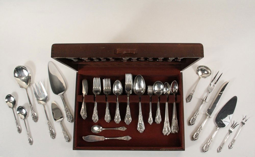 FLATWARE - Cased Set of (111) Pieces of Sterling: FLATWARE - Cased Set of (111) Pieces of Sterling Flatware by Wallace Silversmiths in the Rose Point Pattern, including: (12) dinner knives, (12) butter spreaders, (15) salad/dessert forks, (15) teaspo