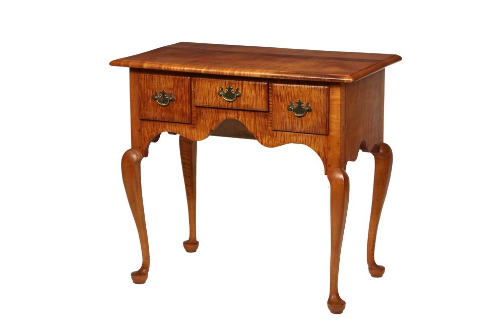 CUSTOM QUEEN ANNE LOWBOY - Early 20th c. Solid Tiger: CUSTOM QUEEN ANNE LOWBOY - Early 20th c. Solid Tiger Maple, with broadly overhanging molded edge top having exposed peg sets, the cabinet holding two deep drawers flanking a single shallow drawer over