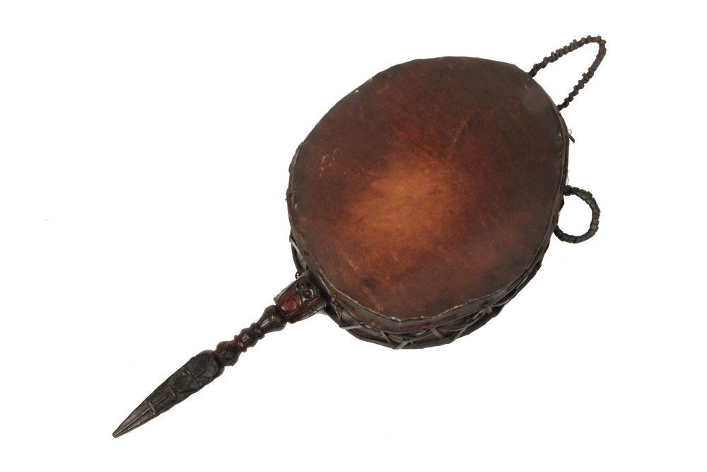 TIBETAN DRUM - Dhangro Dhami Drum, circa 1890-1910,: TIBETAN DRUM - Dhangro Dhami Drum, circa 1890-1910, Buddhist Shaman Healing Instrument with Phurba form hawk's head and human faces handle, double head in cinched horse hide, beads trapped inside, wit