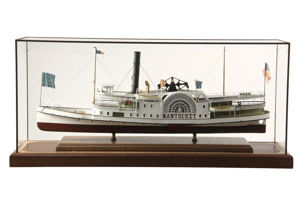 CASED SHIP MODEL - 20th c. Steamboat "Nantucket", a: CASED SHIP MODEL - 20th c. Steamboat "Nantucket", a walking beam sidewheeler, built in 1886 in Wilmington, Delaware for the New Bedford, Martha's Vineyard and Nantucket Steamboat Company. She was 190'