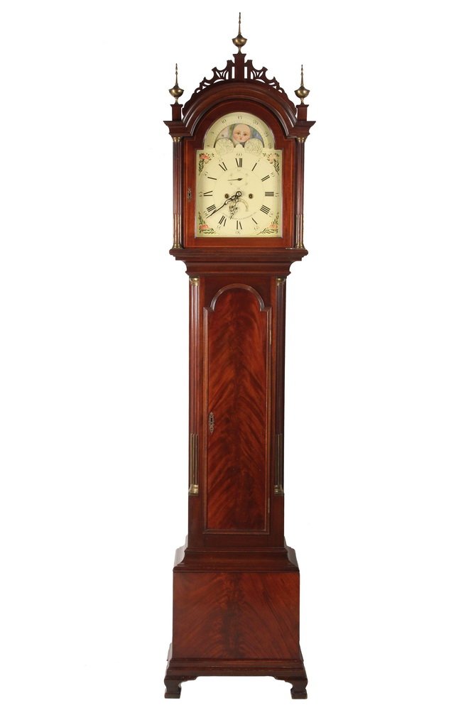 IRVING & CASSON REPLICA TALL CASE CLOCK - Fine Quality: IRVING & CASSON REPLICA TALL CASE CLOCK - Fine Quality Flame Mahogany Chippendale Case with fretwork crest and brass finials on bonnet, full round fluted columns with brass fittings, painted steel dia