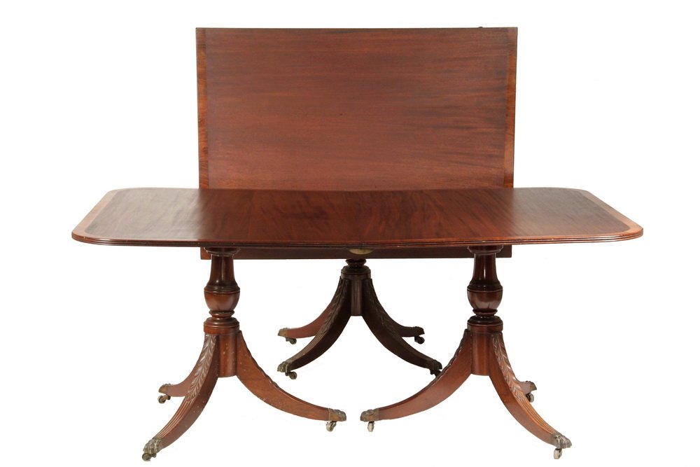 DINING TABLE - Three-Pedestal Mahogany Duncan Phyfe: DINING TABLE - Three-Pedestal Mahogany Duncan Phyfe Style Dining Table by Irving & Casson of Boston, circa 1900, with two additional leaves and all bronze dogs and working latches (the sections are al