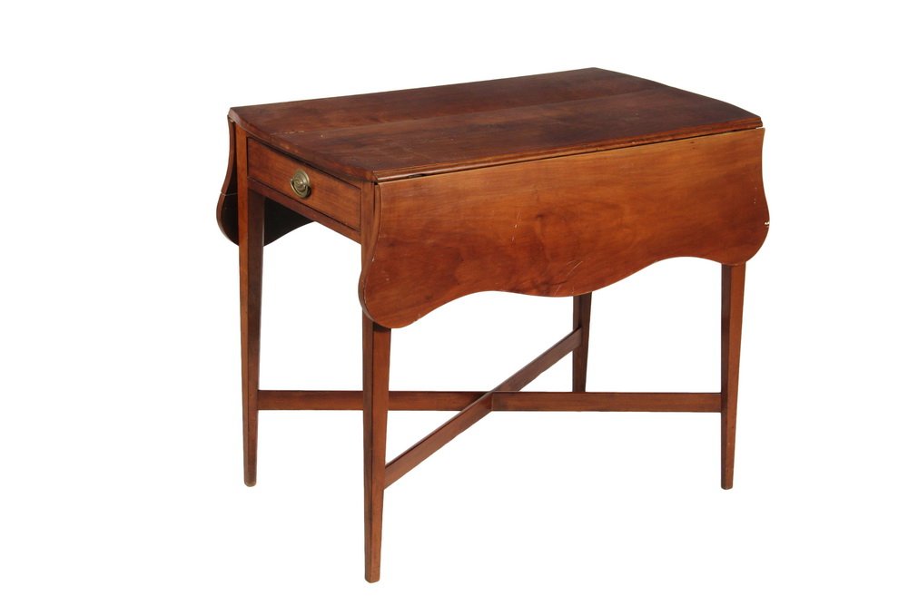 PEMBROKE TABLE - Early 19th c. American Hepplewhite: PEMBROKE TABLE - Early 19th c. American Hepplewhite Drop Leaf Table in cherry, with shaped leaves, single drawer at one end having oval pressed brass bail, tapered square legs with flat X-stretcher, 2
