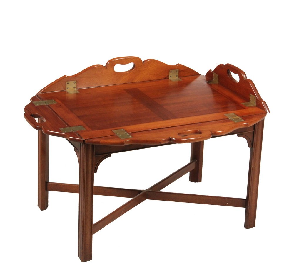 BUTLER'S TRAY TABLE - Mahogany and Brass Coffee Table: BUTLER'S TRAY TABLE - Mahogany and Brass Coffee Table with brass hinged shaped handle sides, the tray top removable from the base, circa 1930s, 17 1/2" to working surface, 21 1/2" to top of sides when