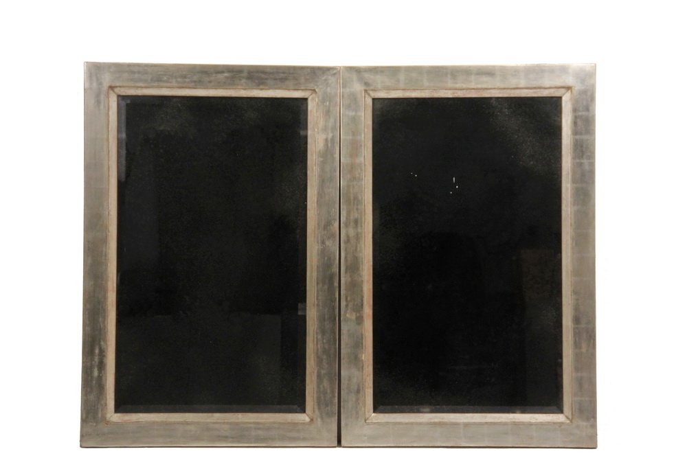 PAIR OF DESIGNER MIRRORS - Contemporary Custom Design: PAIR OF DESIGNER MIRRORS - Contemporary Custom Design from the Therien Studio Workshops, 716 La Cienega Boulevard, Los Angeles, California. From the Marseilles line, in white gold leaf, 48" x 32". Fin