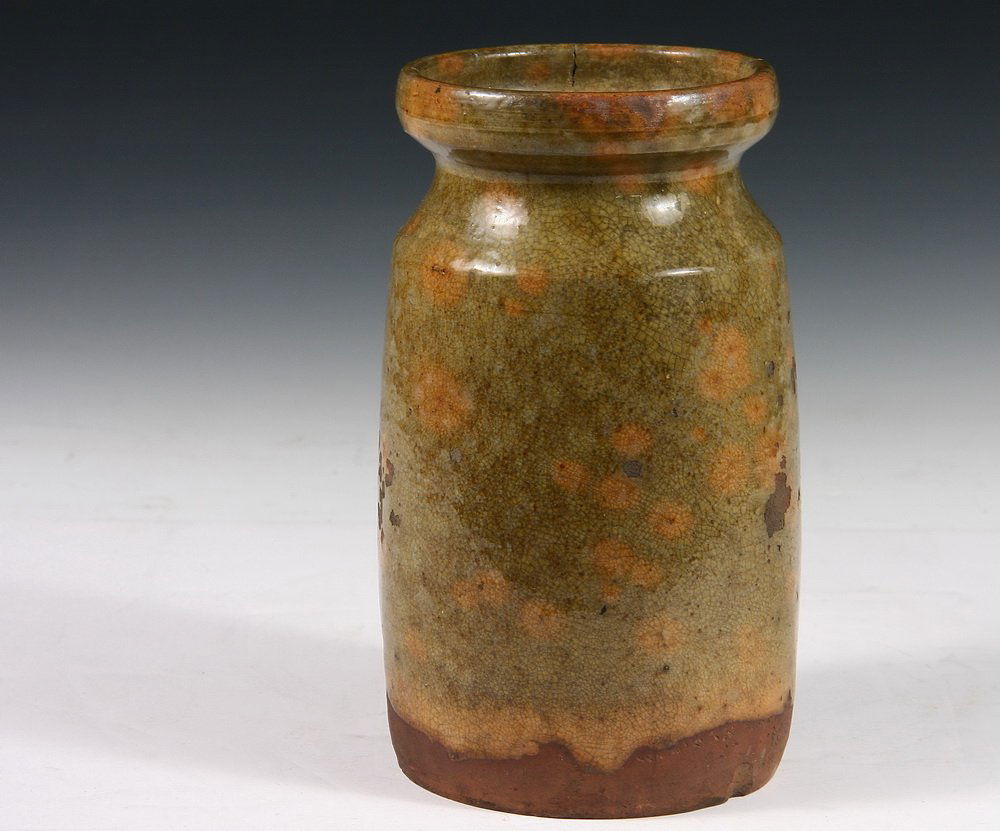 REDWARE OYSTER JAR - Rare Early 19th c. Atlantic: REDWARE OYSTER JAR - Rare Early 19th c. Atlantic Mid-Coast Pottery Oyster Jar in fabulous pear green glaze having ochre dots and border, rolled rim. 8" x 4 3/4" diam. Some loss to glaze.