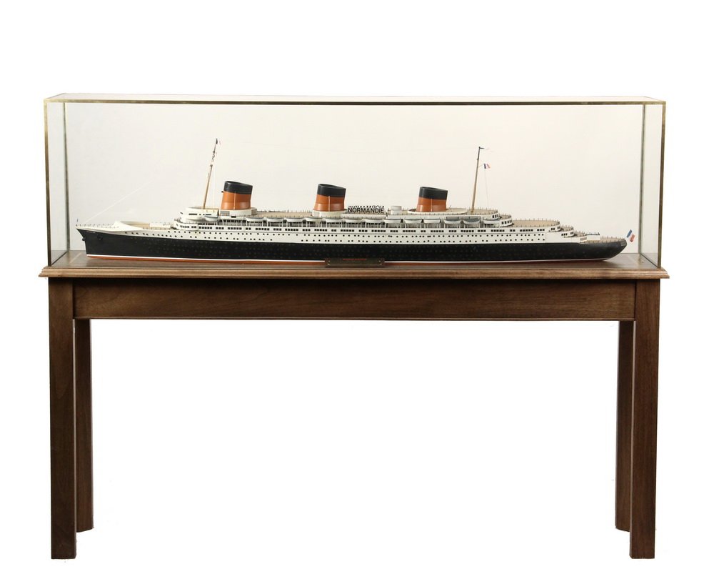 BOARDROOM SHIP MODEL ON STAND - Full Builder's Model of: BOARDROOM SHIP MODEL ON STAND - Full Builder's Model of the "SS Normandie", French Passenger Liner, Built by Chantiers & Ateliers de St. Nazare, Penhoet, France, 1935. 1027' length, 118' breadth, 58'