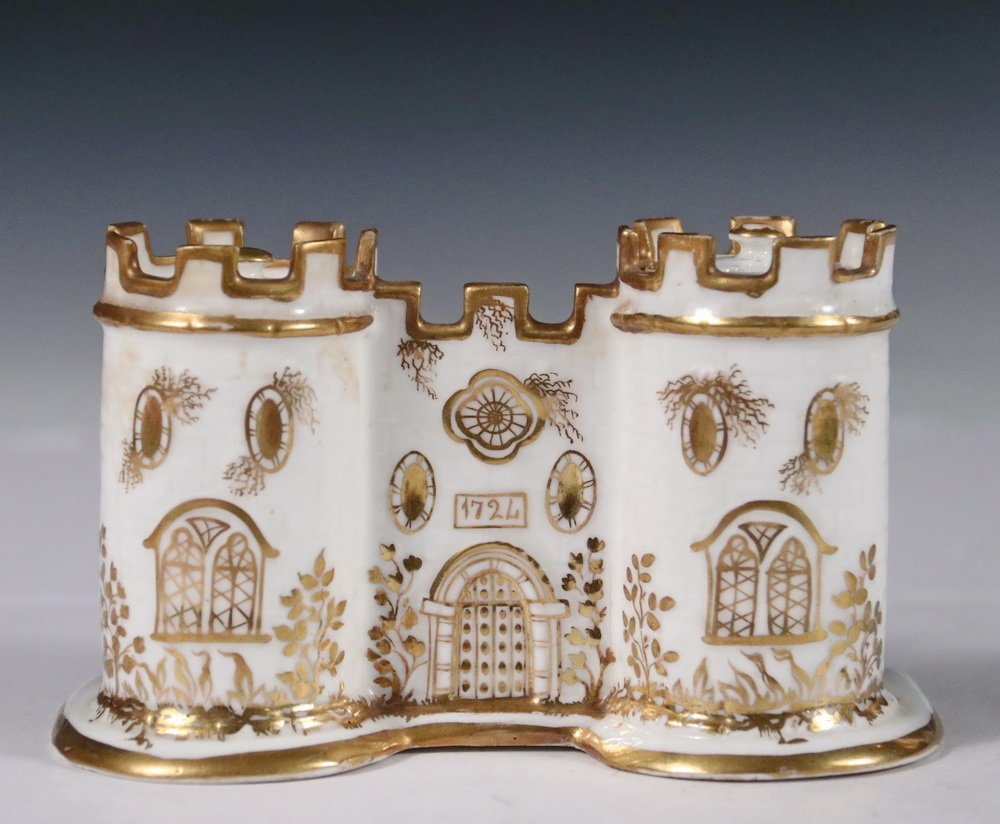 MINTON PORCELAIN INKWELL - Double Inkwell in the form: MINTON PORCELAIN INKWELL - Double Inkwell in the form of a Twin Turreted Castle, dated 1724 (the company was established in 1793), listed as shape no. 43 in the Minton Factory Books. Gilt decoration o