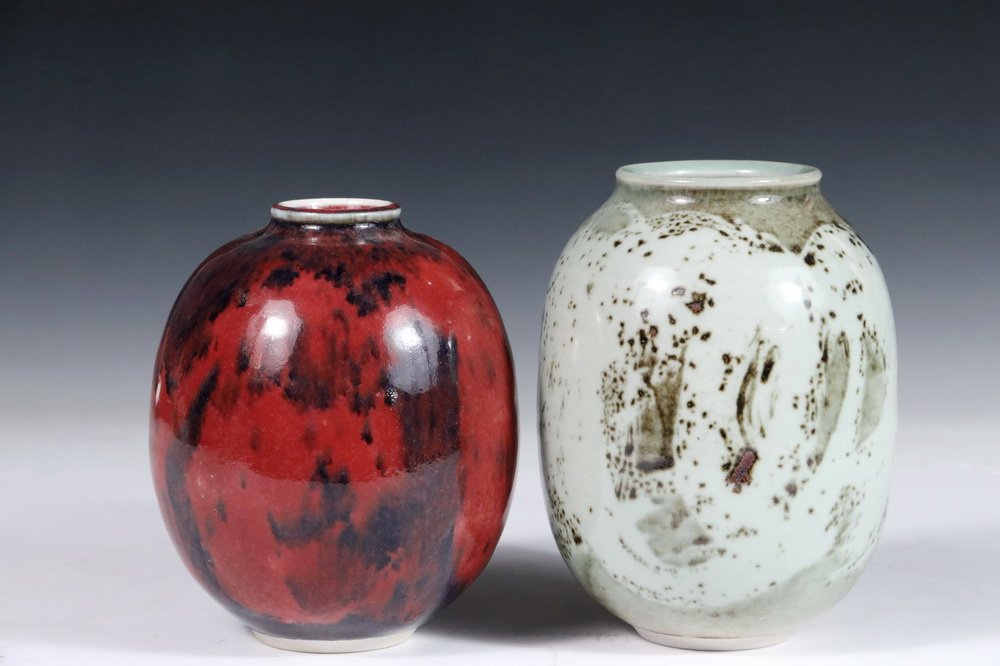 THOMAS BEZANSON (VT, 1929-2007) - Group of (2) Ovoid: THOMAS BEZANSON (VT, 1929-2007) - Group of (2) Ovoid Form Art Pottery Vases, one with copper red and opal blue glaze and the other with mottled celadon glaze, incised on base "Benedictine Monks, Westo