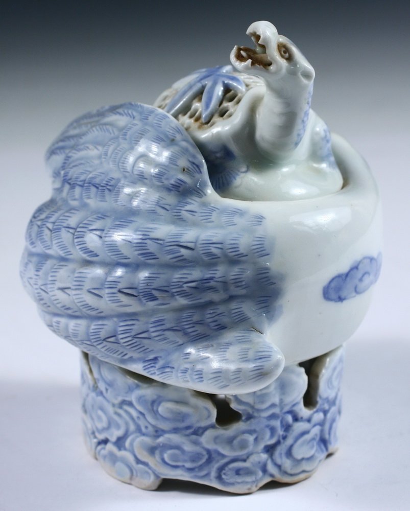 JAPANESE PORCELAIN CENSER - 19th c. Blue and White: JAPANESE PORCELAIN CENSER - 19th c. Blue and White Export, in the form of a Turtle atop a Goose, his back meshed for smoke, his head raised and mouth agape, the goose is nesting on a ring of reticulat