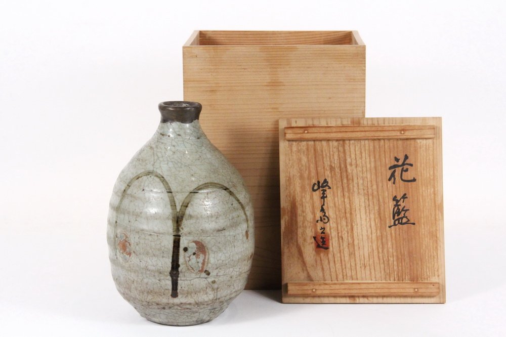 KOREAN POTTERY BOTTLE - Punch'ong Ware Wine Bottle,: KOREAN POTTERY BOTTLE - Punch'ong Ware Wine Bottle, Choson dynasty, in squat ovoid teardrop form with narrow flared neck, having grey crackled glaze with two green plant forms, 8" x 5" diam. Old fired