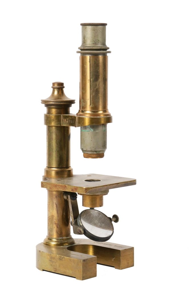 ANTIQUE MICROSCOPE - 19th c. Solid Brass Austrian: ANTIQUE MICROSCOPE - 19th c. Solid Brass Austrian Monocular Microscope by Carl Reichert of Vienna, marked "VIII Hennogasse 26" and with s/n 9899, having a column form post and horseshoe base. 10" tall