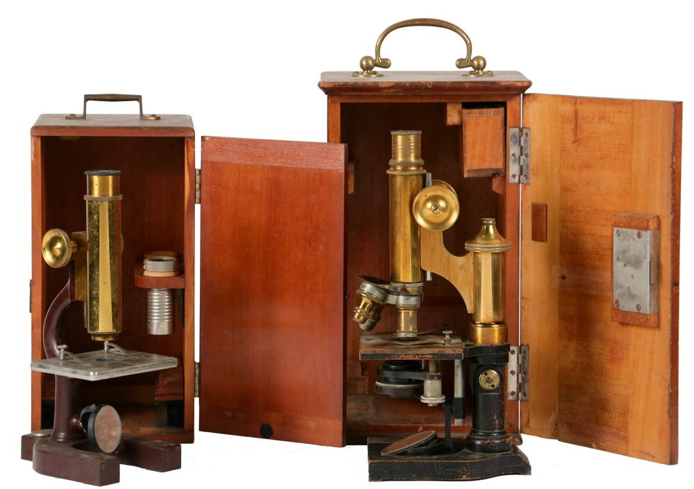 (2) CASED MICROSCOPES - Early 20th c. Microsopes in: (2) CASED MICROSCOPES - Early 20th c. Microsopes in brass and painted iron, with mahogany cases, including: E. Leitz Wetzlar, s/n 118811, with three lenses on rotating mount, case has key, 11 3/4" tal
