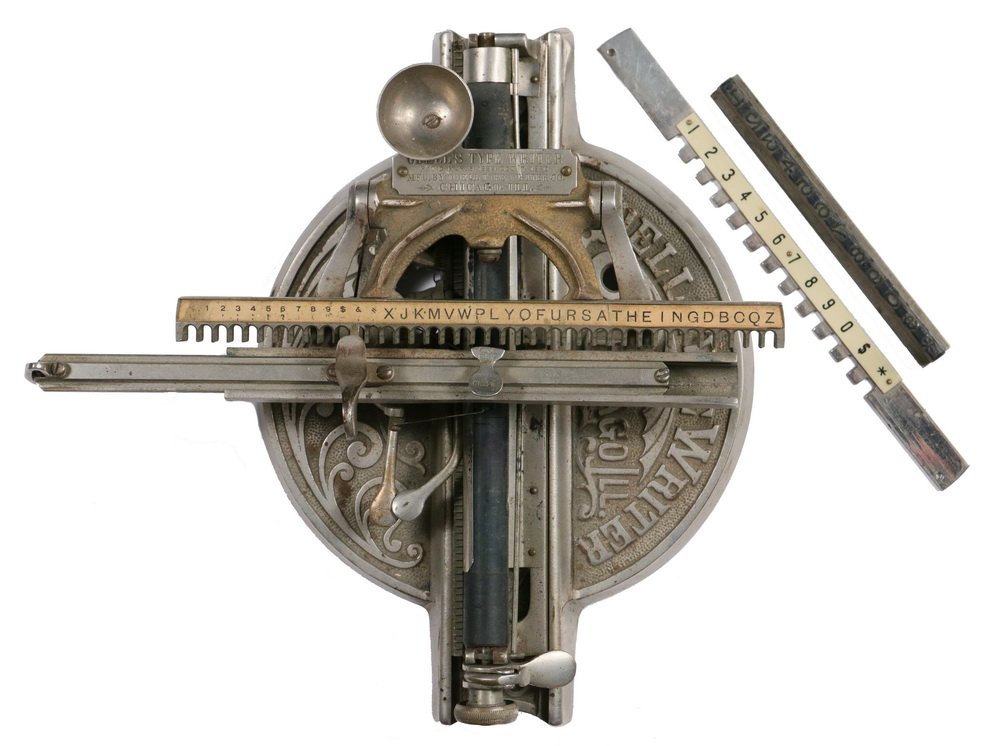 RARE EARLY AMERICAN TYPEWRITER - Odell #2 Index: RARE EARLY AMERICAN TYPEWRITER - Odell #2 Index Typewriter, circa 1890, manufactured by the Odell Type Writer Co., Chicago, Ill. Nickel plated steel with embossed logo and engraved chromed patent plat